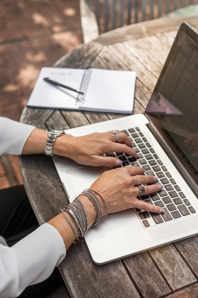 person-typing-on-macbook-pro-on-brown-wooden-table-during-daytime-photo-0qvtyp0gh3a person-typing-on-macbook-pro-on-brown-wooden-table-during-daytime-photo-0qvtyp0gh3a